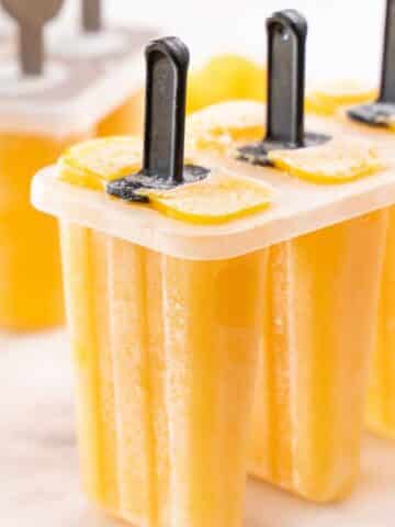 mango popsicles in a mold